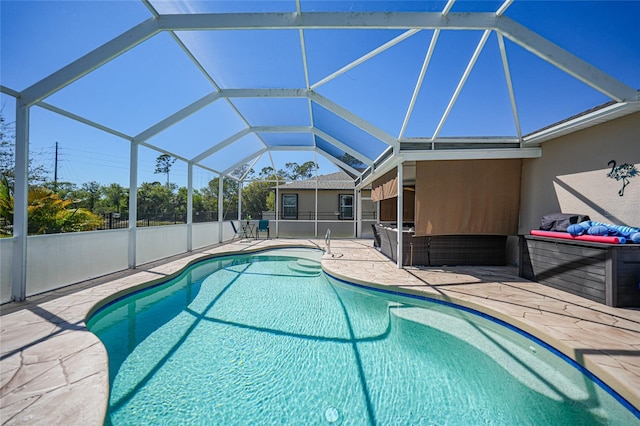 pool featuring a patio and a lanai