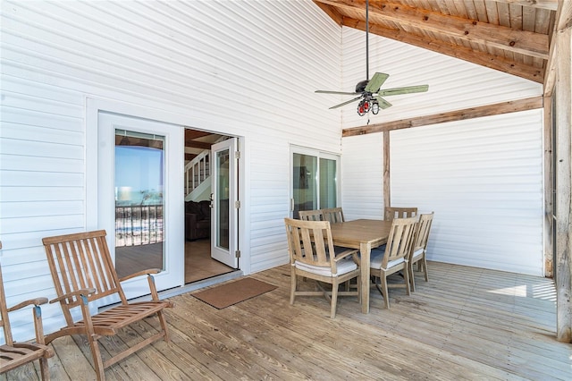 exterior space with outdoor dining space and a ceiling fan