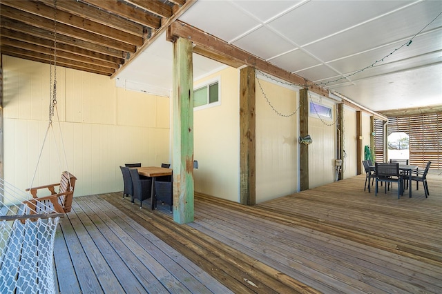 deck with outdoor dining space