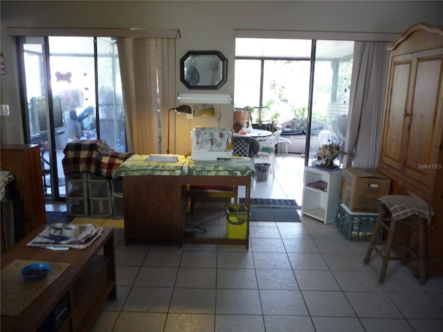 living area with light tile patterned floors