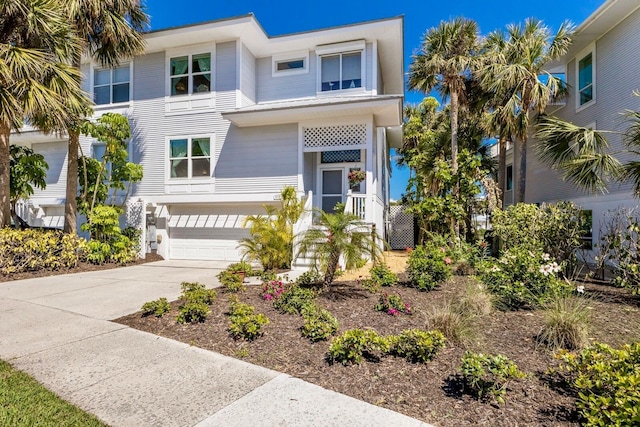 view of front of property with driveway and an attached garage