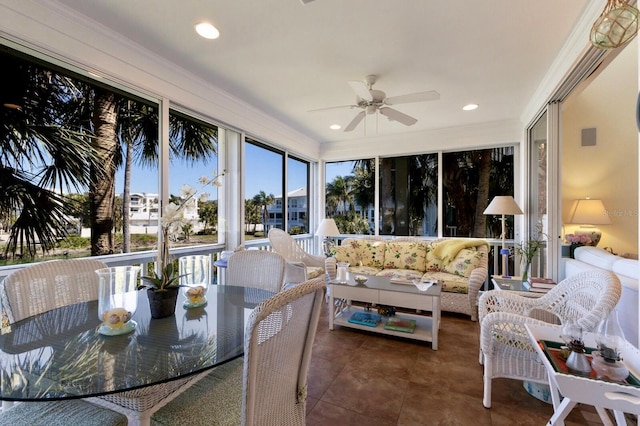 sunroom / solarium with ceiling fan