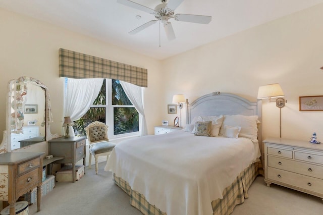 bedroom with light colored carpet and ceiling fan