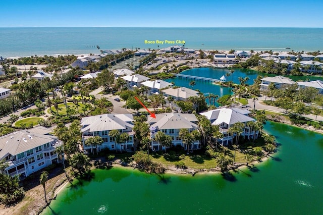 bird's eye view featuring a residential view and a water view