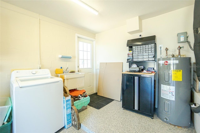laundry room with laundry area, washer / clothes dryer, water heater, and a sink