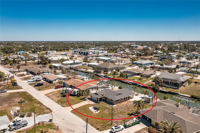 birds eye view of property with a residential view