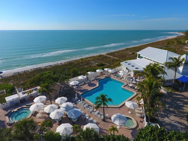 5000 Gasparilla Rd Unit 41B, Boca Grande, FL 33921 - bird's eye view of waterfront with a beach and a pool area