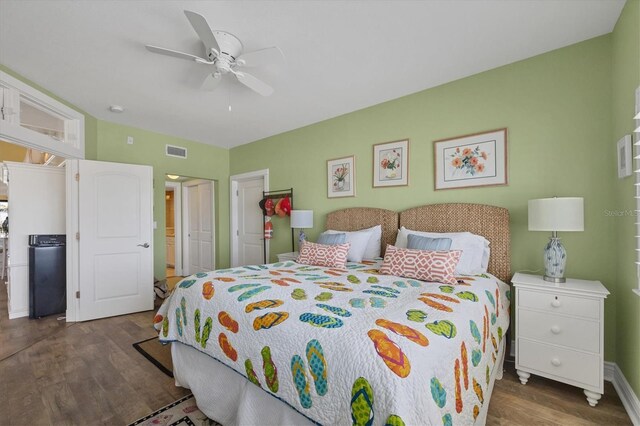 5000 Gasparilla Rd Unit 41B, Boca Grande, FL 33921 - bedroom featuring wood finished floors, ceiling fan, a closet, and baseboards