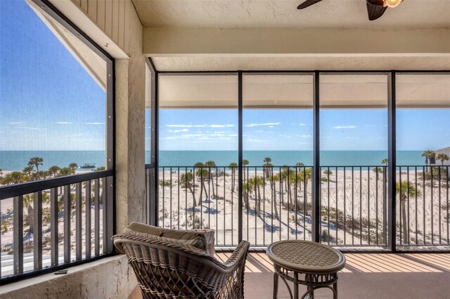 5000 Gasparilla Rd Unit 41B, Boca Grande, FL 33921 - sunroom / solarium with view of water and beach