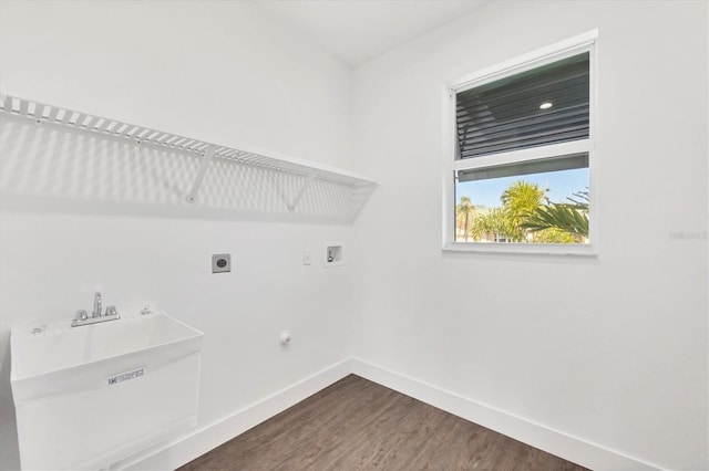 laundry area with wood finished floors, electric dryer hookup, laundry area, baseboards, and hookup for a washing machine