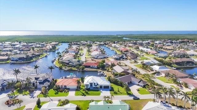 aerial view with a water view and a residential view