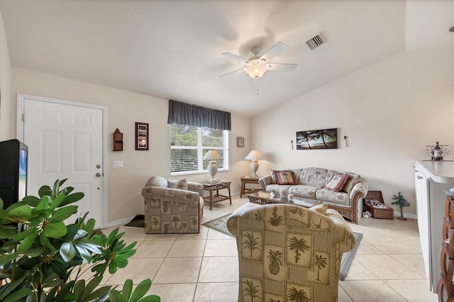 living area featuring ceiling fan, visible vents, vaulted ceiling, and light tile patterned floors