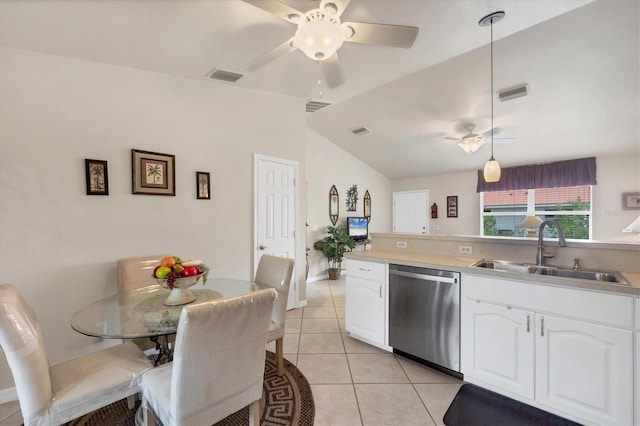 kitchen featuring visible vents, a sink, stainless steel dishwasher, and a ceiling fan