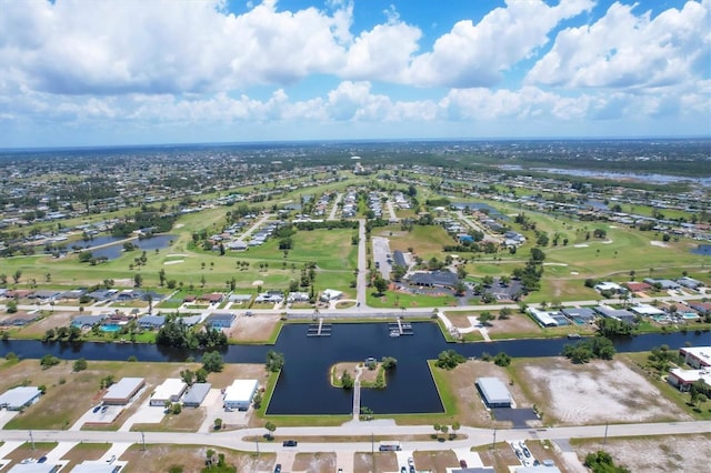 birds eye view of property featuring a residential view and a water view