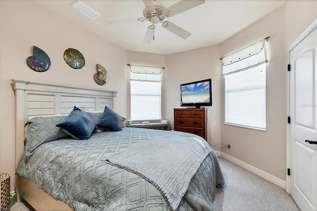 14810 Ingraham Blvd, Port Charlotte, FL 33981 - bedroom with carpet, baseboards, multiple windows, and a ceiling fan