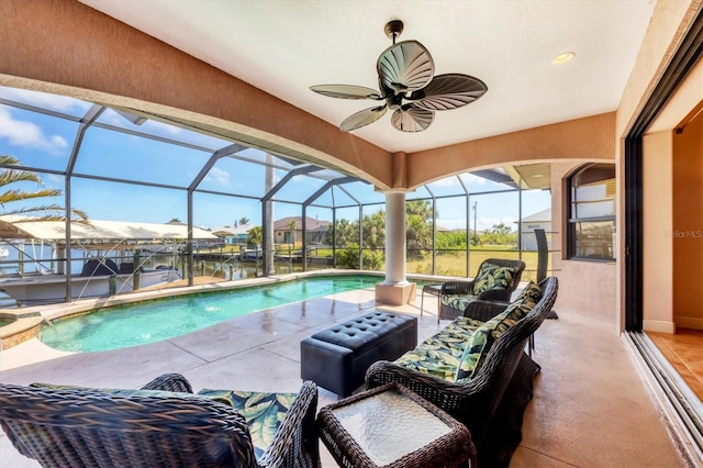 14810 Ingraham Blvd, Port Charlotte, FL 33981 - view of pool featuring boat lift, a dock, a patio, a pool with connected hot tub, and a lanai