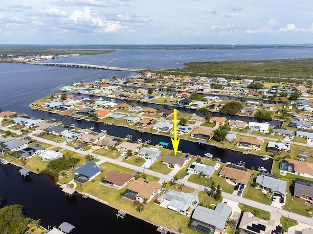 5266 Cooper Ter, Port Charlotte, FL 33981 - aerial overview of property's location featuring a large body of water and nearby suburban area