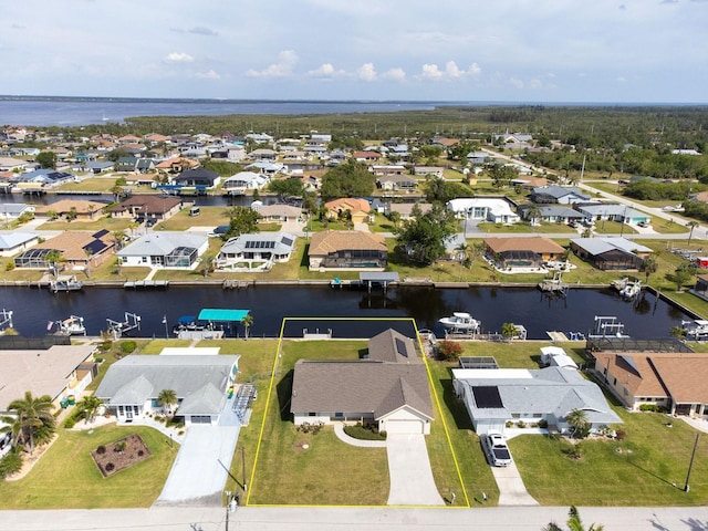 5266 Cooper Ter, Port Charlotte, FL 33981 - aerial view of residential area with property boundaries highlighted and a nearby body of water