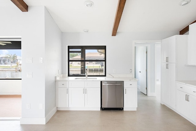 5266 Cooper Ter, Port Charlotte, FL 33981 - kitchen featuring dishwasher, beamed ceiling, white cabinetry, and light stone counters