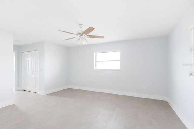 5266 Cooper Ter, Port Charlotte, FL 33981 - empty room with a ceiling fan and baseboards