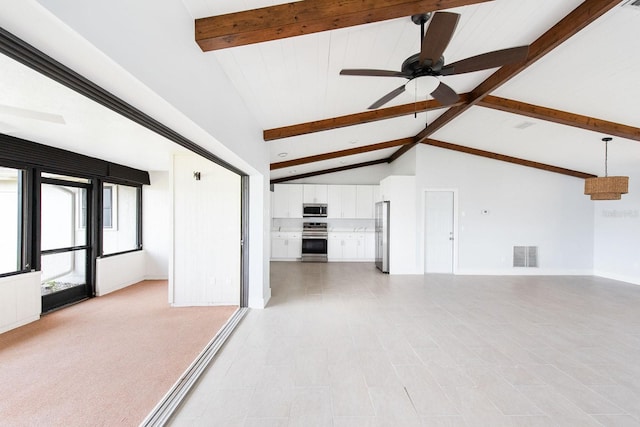 5266 Cooper Ter, Port Charlotte, FL 33981 - unfurnished living room featuring beam ceiling, a ceiling fan, and high vaulted ceiling