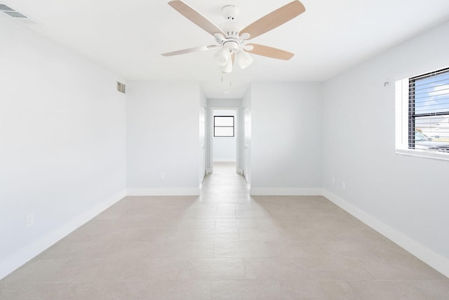 5266 Cooper Ter, Port Charlotte, FL 33981 - empty room featuring ceiling fan and baseboards