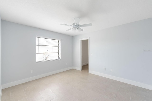 5266 Cooper Ter, Port Charlotte, FL 33981 - empty room featuring ceiling fan and baseboards
