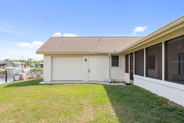 5266 Cooper Ter, Port Charlotte, FL 33981 - view of grassy yard featuring a garage