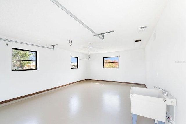 5266 Cooper Ter, Port Charlotte, FL 33981 - empty room with concrete floors and a sink