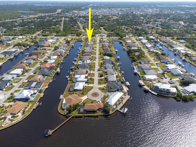 5266 Cooper Ter, Port Charlotte, FL 33981 - aerial view of property and surrounding area featuring nearby suburban area and a large body of water