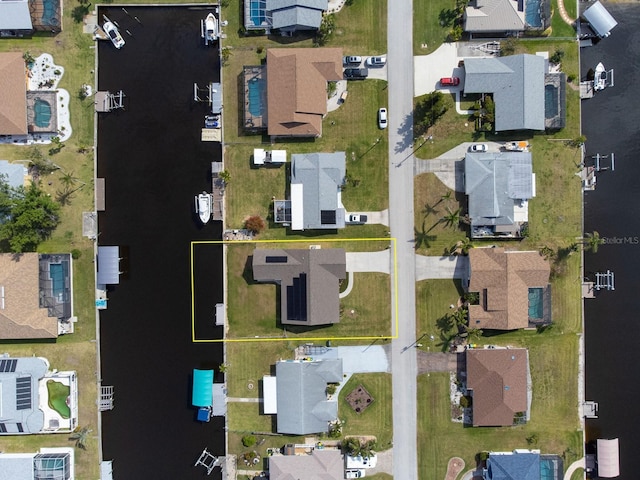 5266 Cooper Ter, Port Charlotte, FL 33981 - aerial overview of property's location featuring nearby suburban area and property boundaries highlighted