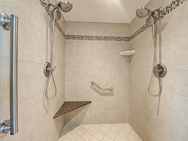 full bathroom with tiled shower