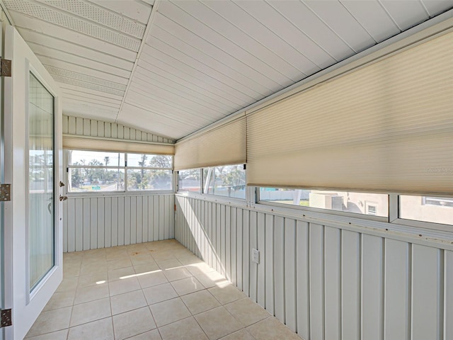 unfurnished sunroom featuring plenty of natural light