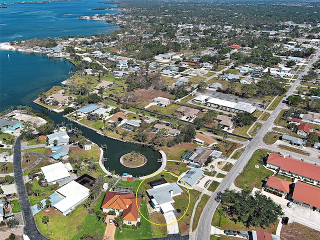 bird's eye view featuring a residential view and a water view