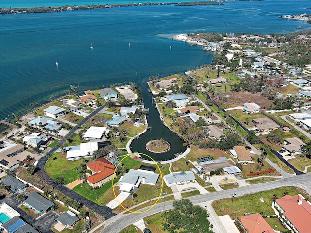 bird's eye view with a water view and a residential view