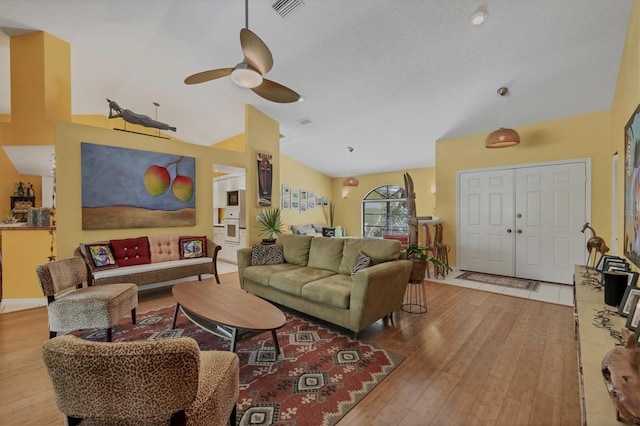850 Van Gogh Rd, Englewood, FL 34223 - living area featuring wood finished floors, a ceiling fan, and high vaulted ceiling