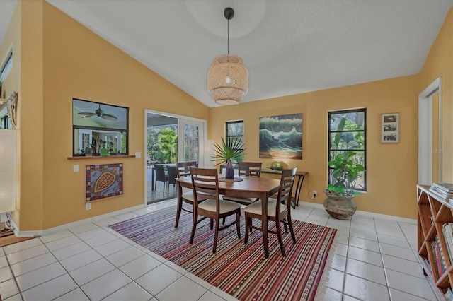 850 Van Gogh Rd, Englewood, FL 34223 - dining area featuring light tile patterned floors, vaulted ceiling, and a ceiling fan