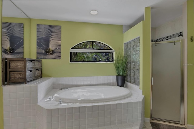 850 Van Gogh Rd, Englewood, FL 34223 - full bath featuring a bath, a stall shower, and tile patterned flooring