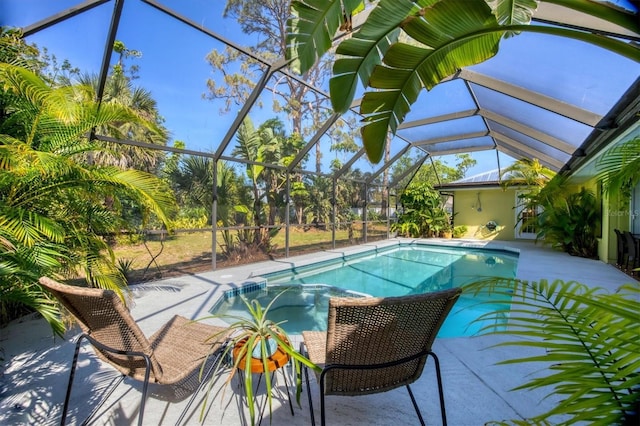 850 Van Gogh Rd, Englewood, FL 34223 - view of pool with a pool with connected hot tub, a patio, and a lanai