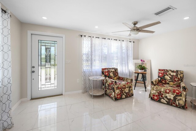 1493 Kathleen Pl, Englewood, FL 34223 - sitting room with recessed lighting, a ceiling fan, baseboards, and marble finish floors