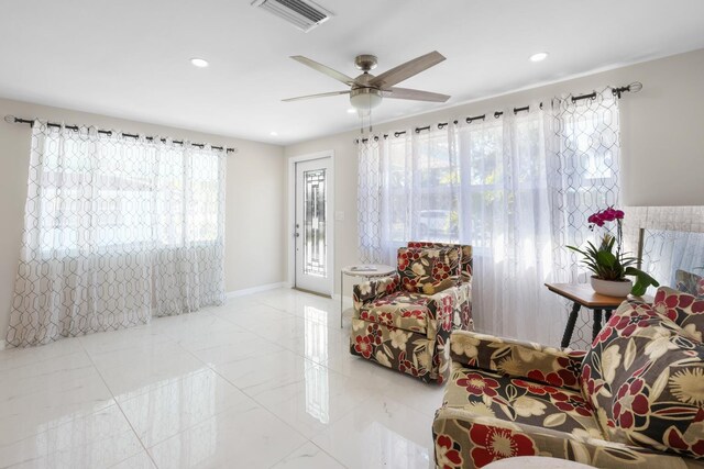 1493 Kathleen Pl, Englewood, FL 34223 - sitting room with a ceiling fan, recessed lighting, and baseboards