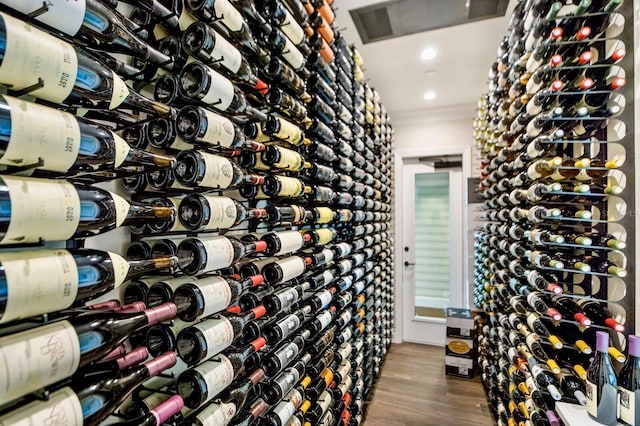 768 Seaboard Line Ln, Boca Grande, FL 33921 - wine room with wood finished floors and recessed lighting