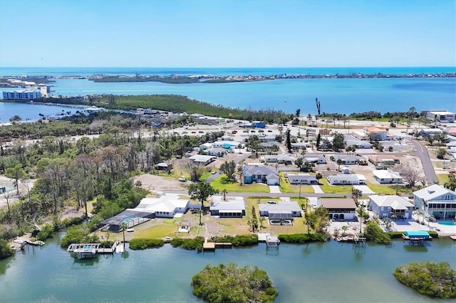 birds eye view of property featuring a residential view and a water view