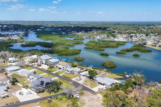 bird's eye view with a water view and a residential view