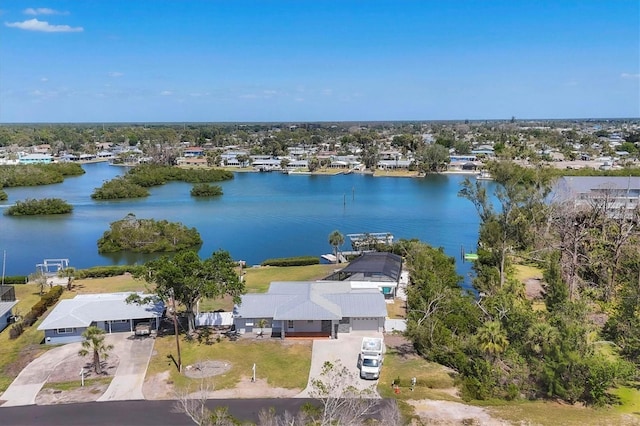 bird's eye view with a residential view and a water view
