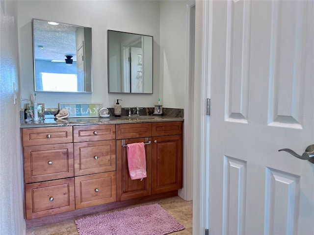 8152 Little Gasparilla Is, Placida, FL 33946 - bathroom featuring a ceiling fan and vanity