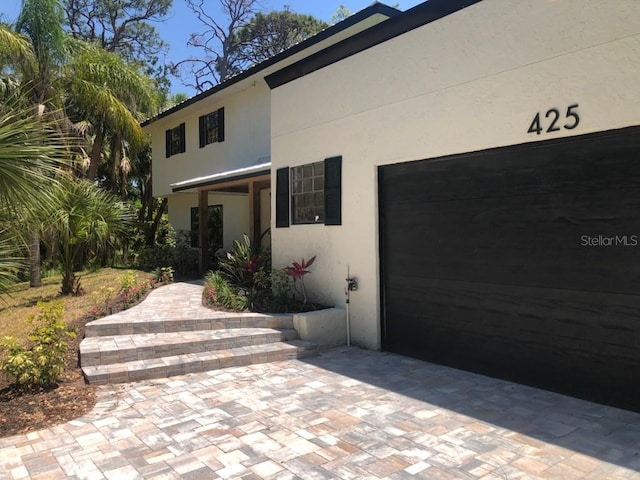 view of front of house featuring stucco siding