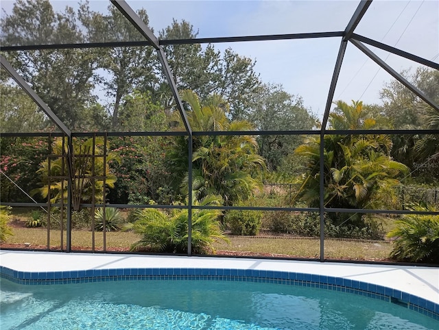 outdoor pool with glass enclosure