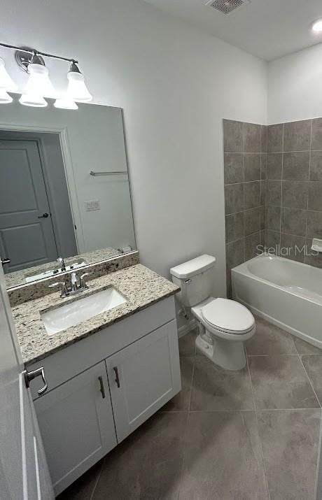 15968 Honeysuckle St, Port Charlotte, FL 33953 - full bath with toilet, a bath, vanity, and tile patterned flooring