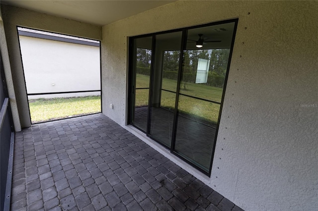 15968 Honeysuckle St, Port Charlotte, FL 33953 - unfurnished sunroom with ceiling fan